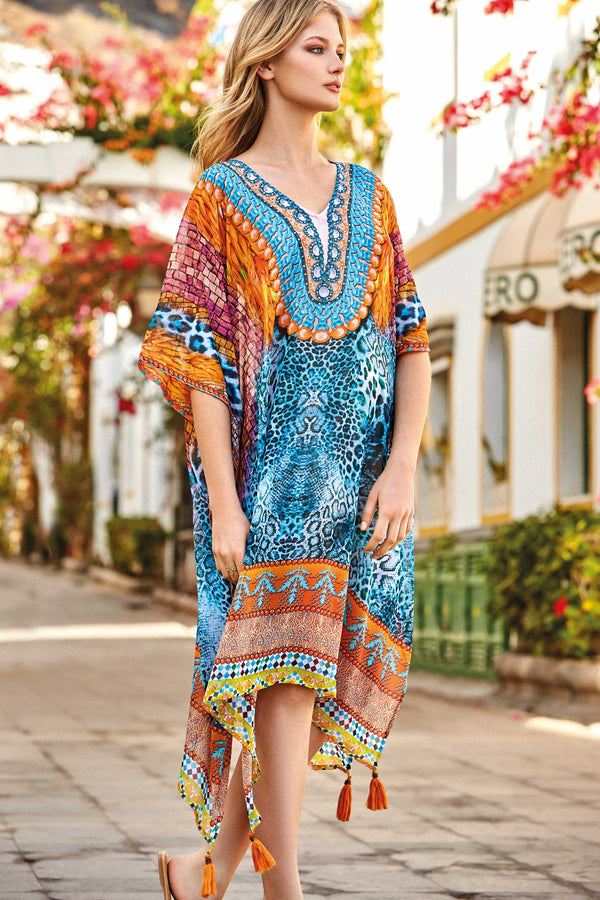 PONCHO MANCHAS TURQUESA